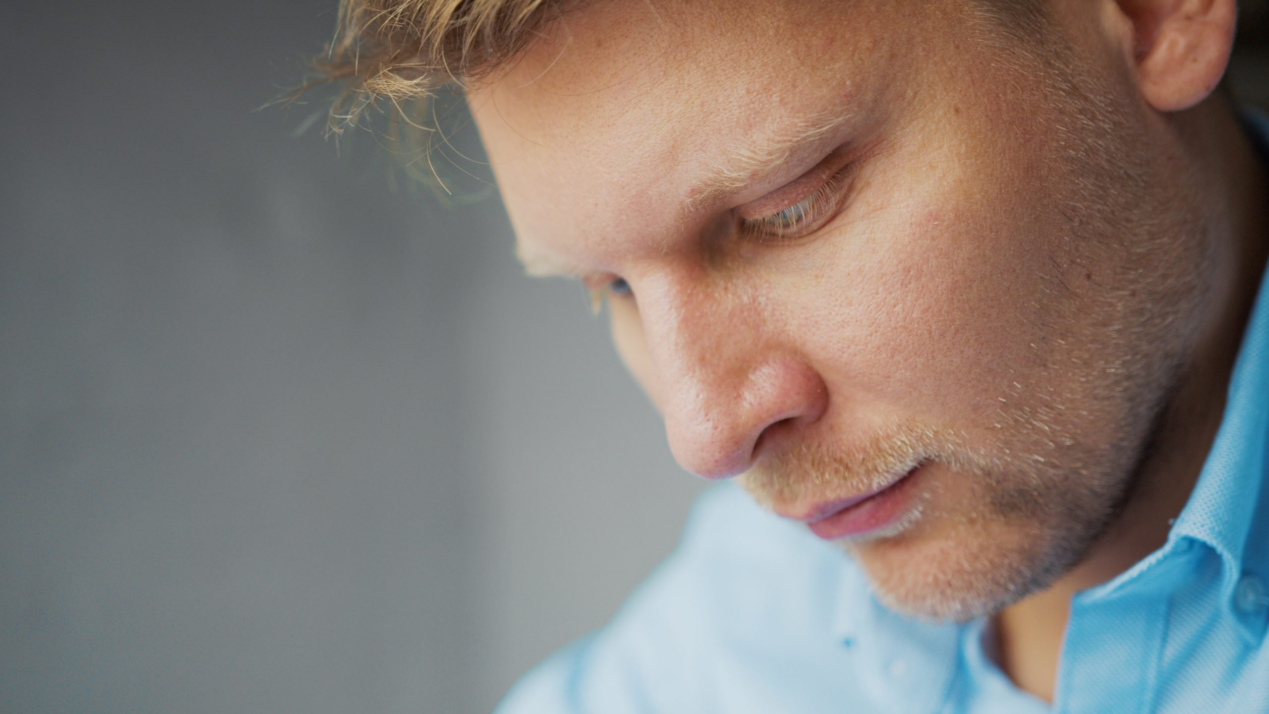 Thinking man at work, close-up