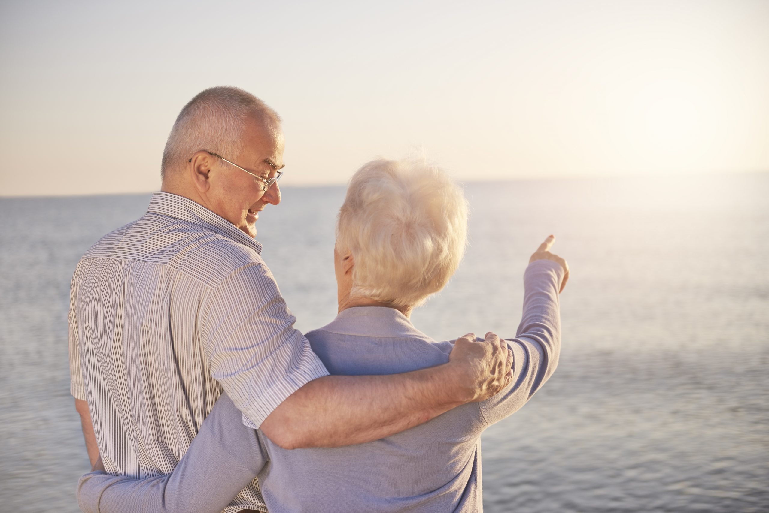 Woman in old age pointing at something