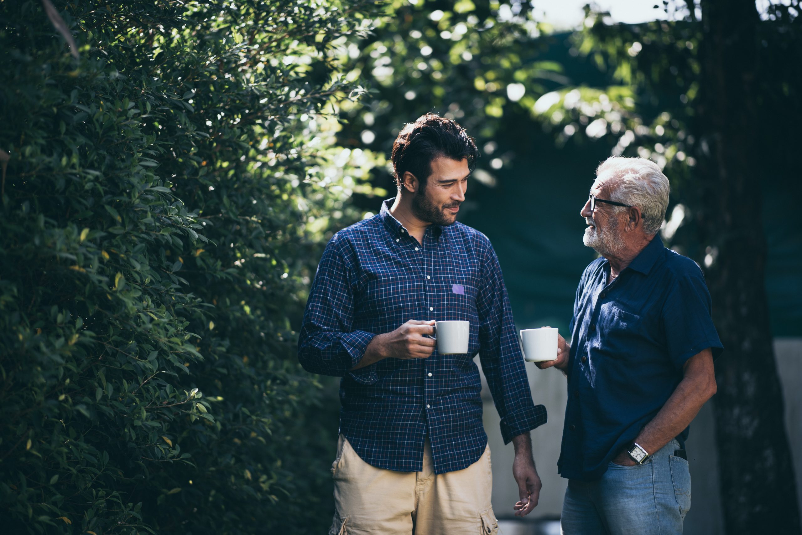 Happy Father and son with coffee cup