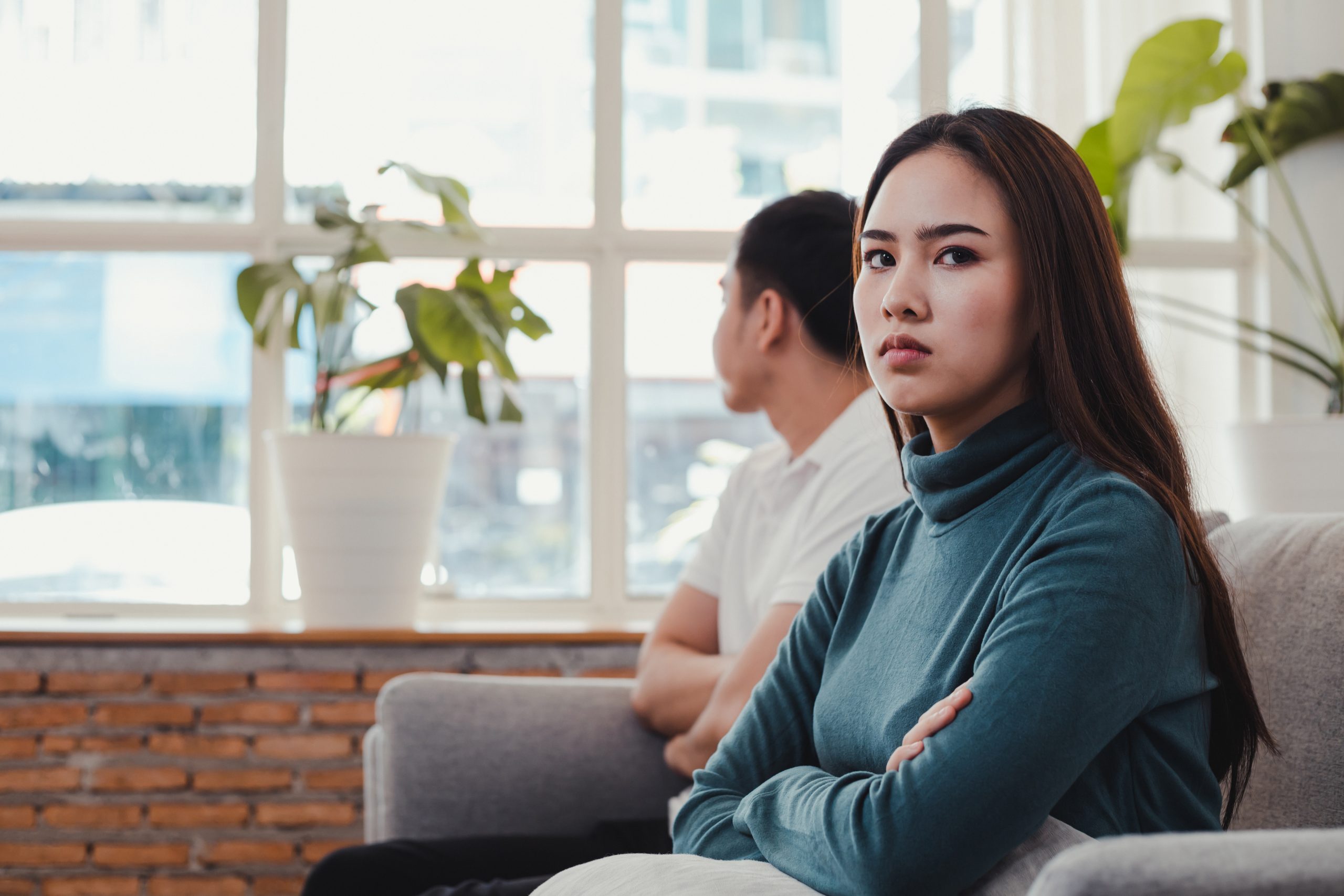 Woman hurt her boyfriend while her boyfriend was hurt as well. Girl is angry with boyfriend. Wife is angry with the husband. Crisis and relationship problems that come to an end.