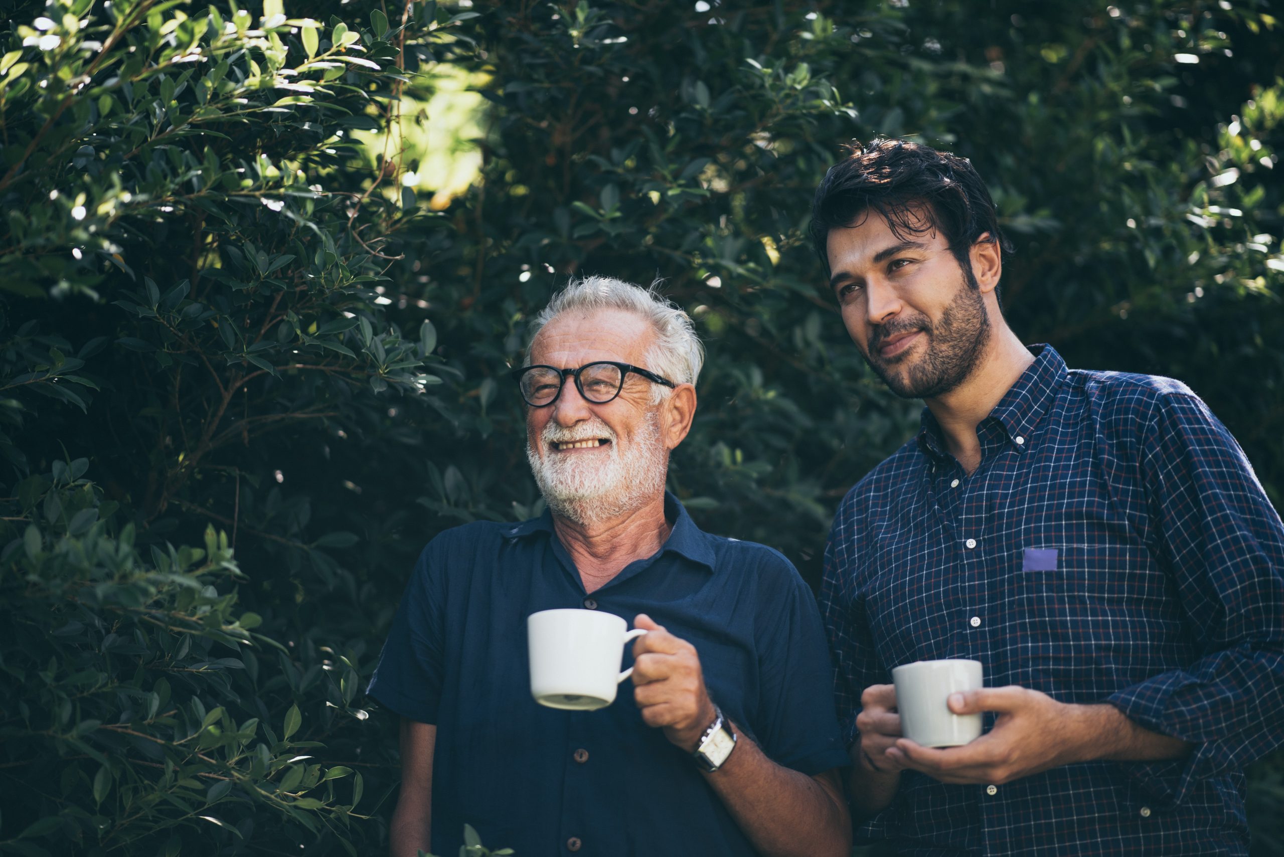 Happy Father and son with coffee cup