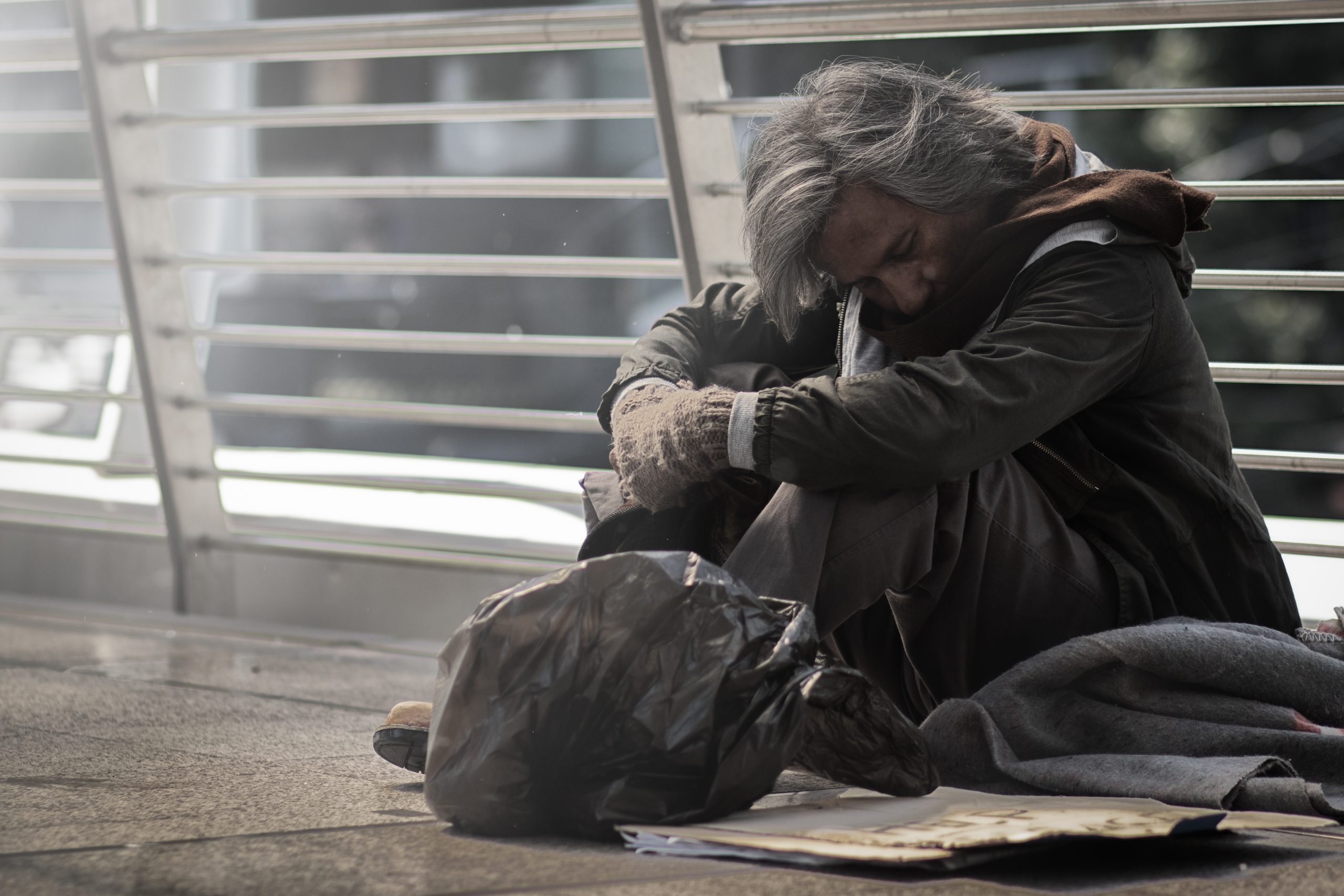 Homeless people living in various cities He waited and needed help from the kind people to give him all the necessary things, clothing, bread, water, and home. He is dirty and has no money with him.