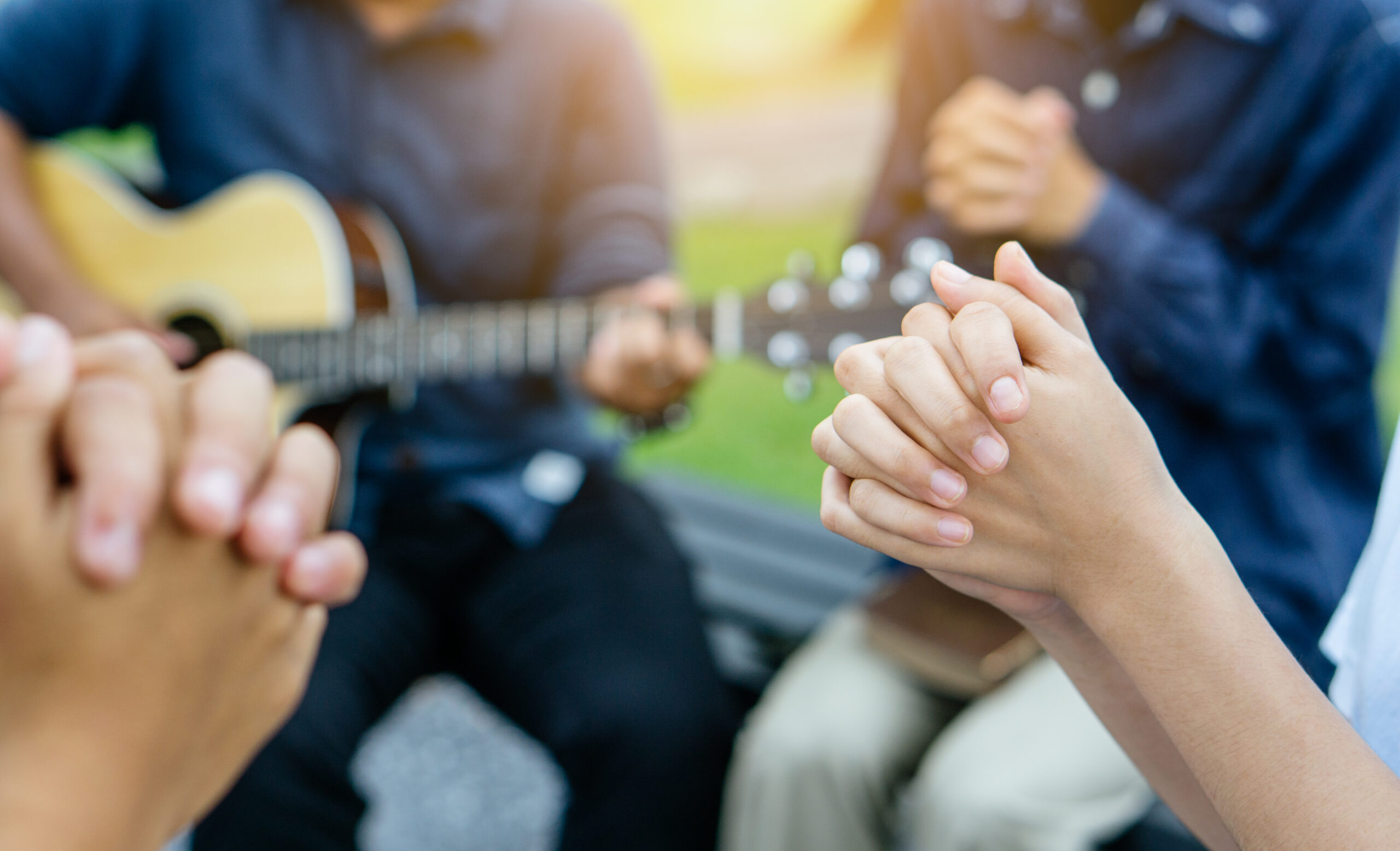 Group of people praying and worship god.