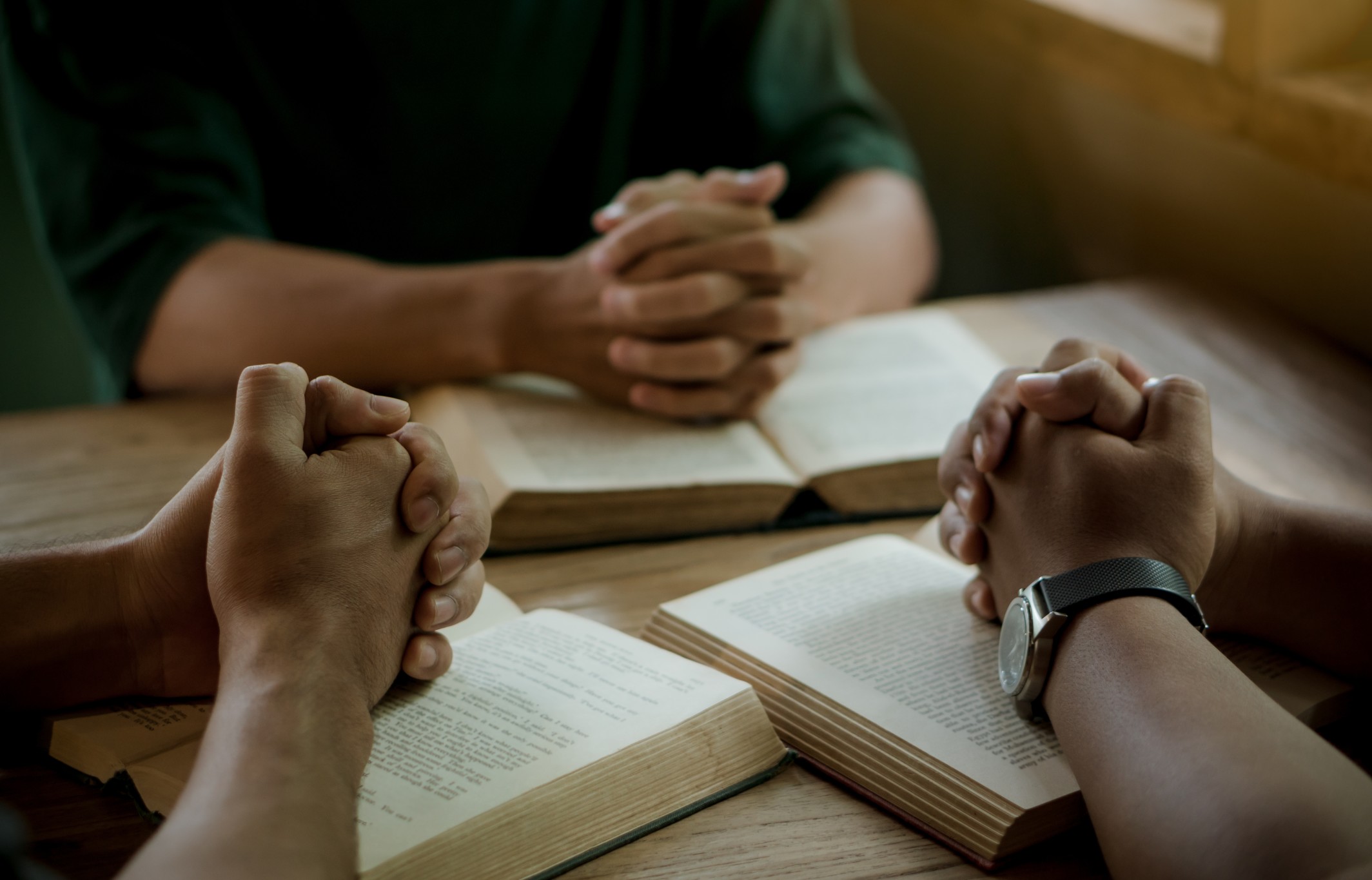 group-of-christian-people-reading-and-study-bible-in-home-and-pray-together_t20_1dRWL9