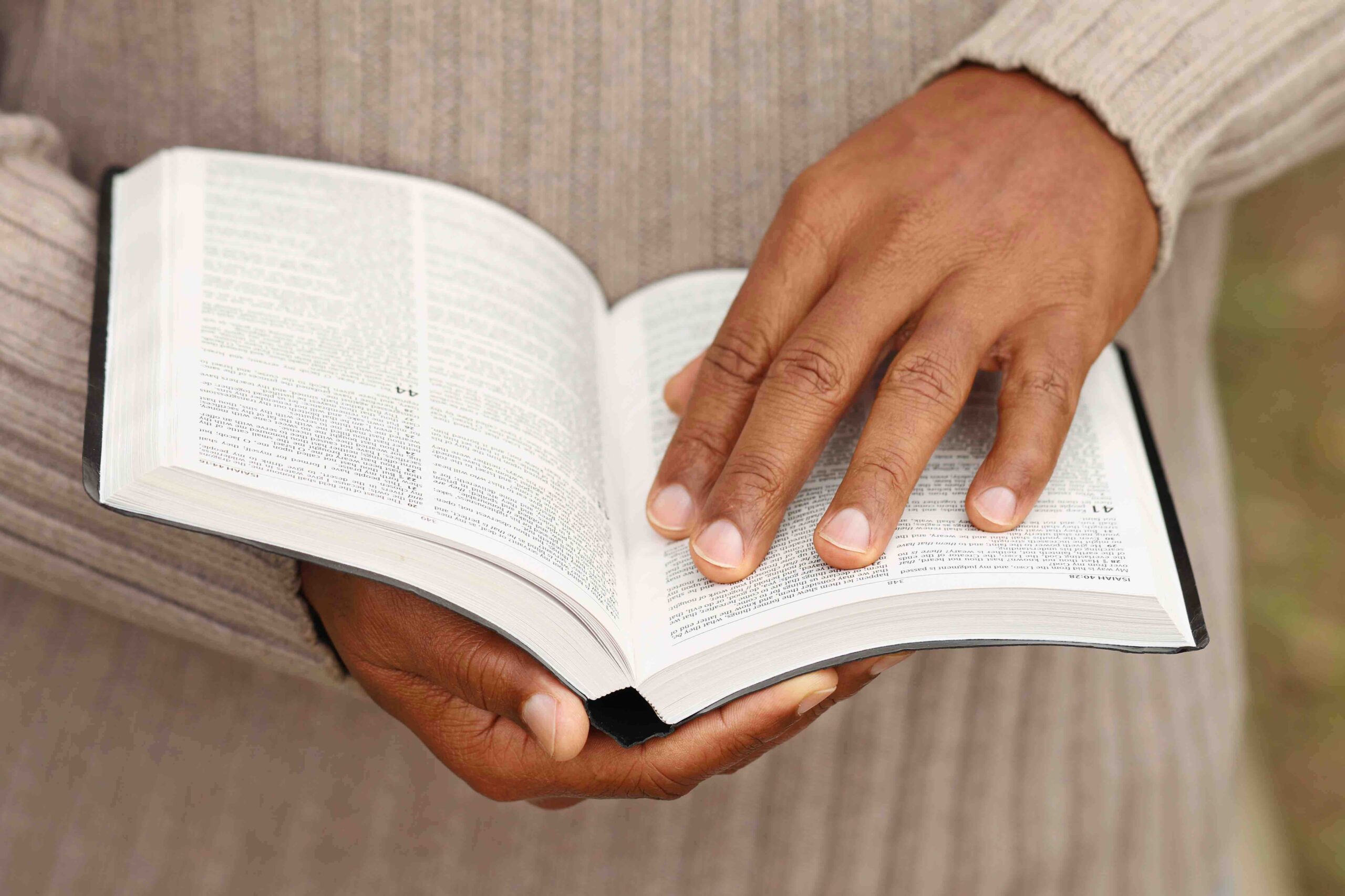 Man holding a Bible