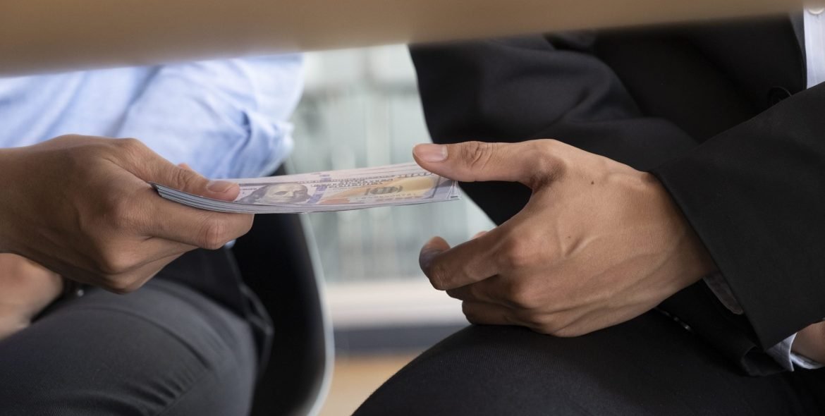 Bribery and corruption concepts. Businessman receive money.