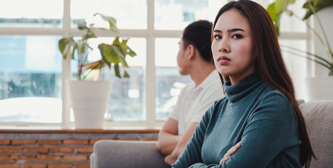 Woman hurt her boyfriend while her boyfriend was hurt as well. Girl is angry with boyfriend. Wife is angry with the husband. Crisis and relationship problems that come to an end.