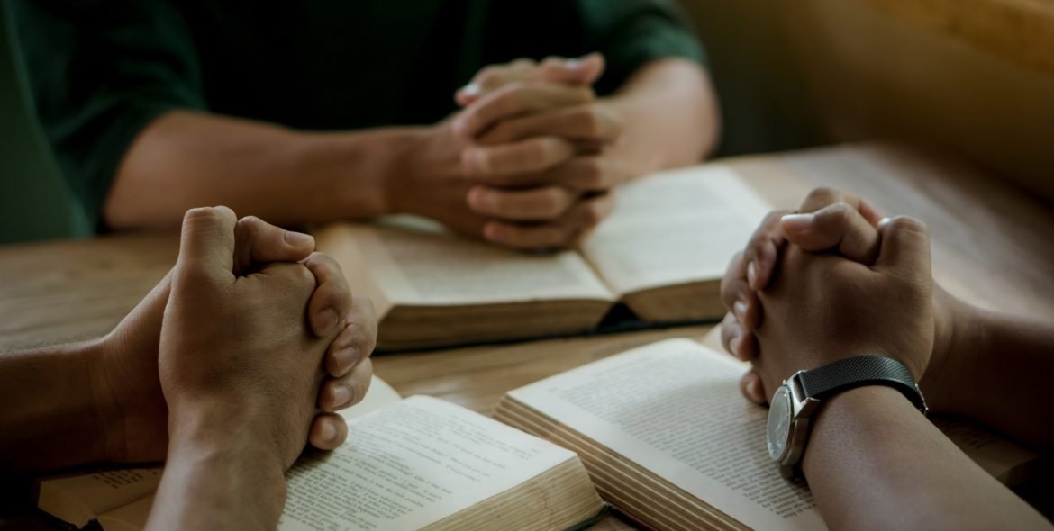 group-of-christian-people-reading-and-study-bible-in-home-and-pray-together_t20_1dRWL9