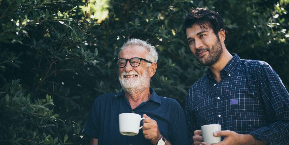 Happy Father and son with coffee cup