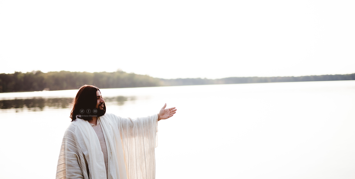 jesus-christ-standing-near-water-while-lending-a-h-2023-01-19-18-46-03-utc