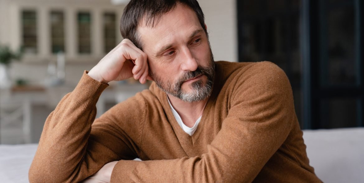 Midlife crisis problems. Mature lonely depressed divorced man, tired, fatigued needless feeling. Health problems, illness concept