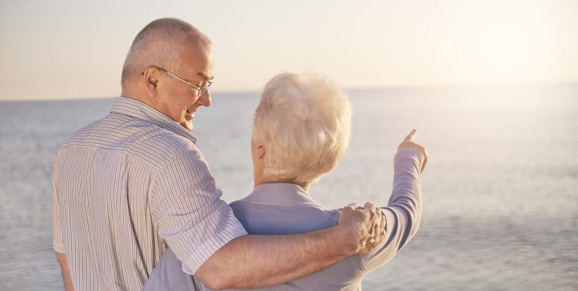 Woman in old age pointing at something