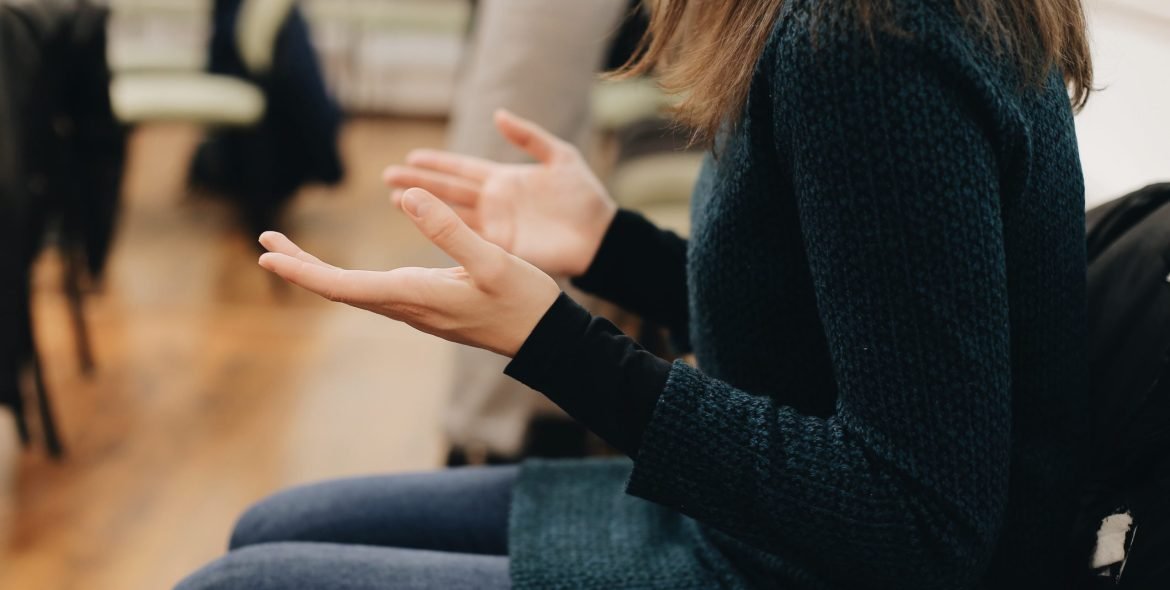 young-woman-praying-and-lifting-her-hands-2021-09-01-12-50-10-utc