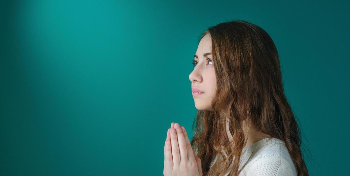 young-woman-praying-free-photo